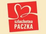 Czerwone logo Szlachetnej Paczki. Czerwony kwadrat z napisem "Szlachetna Paczka" i kontur serca.